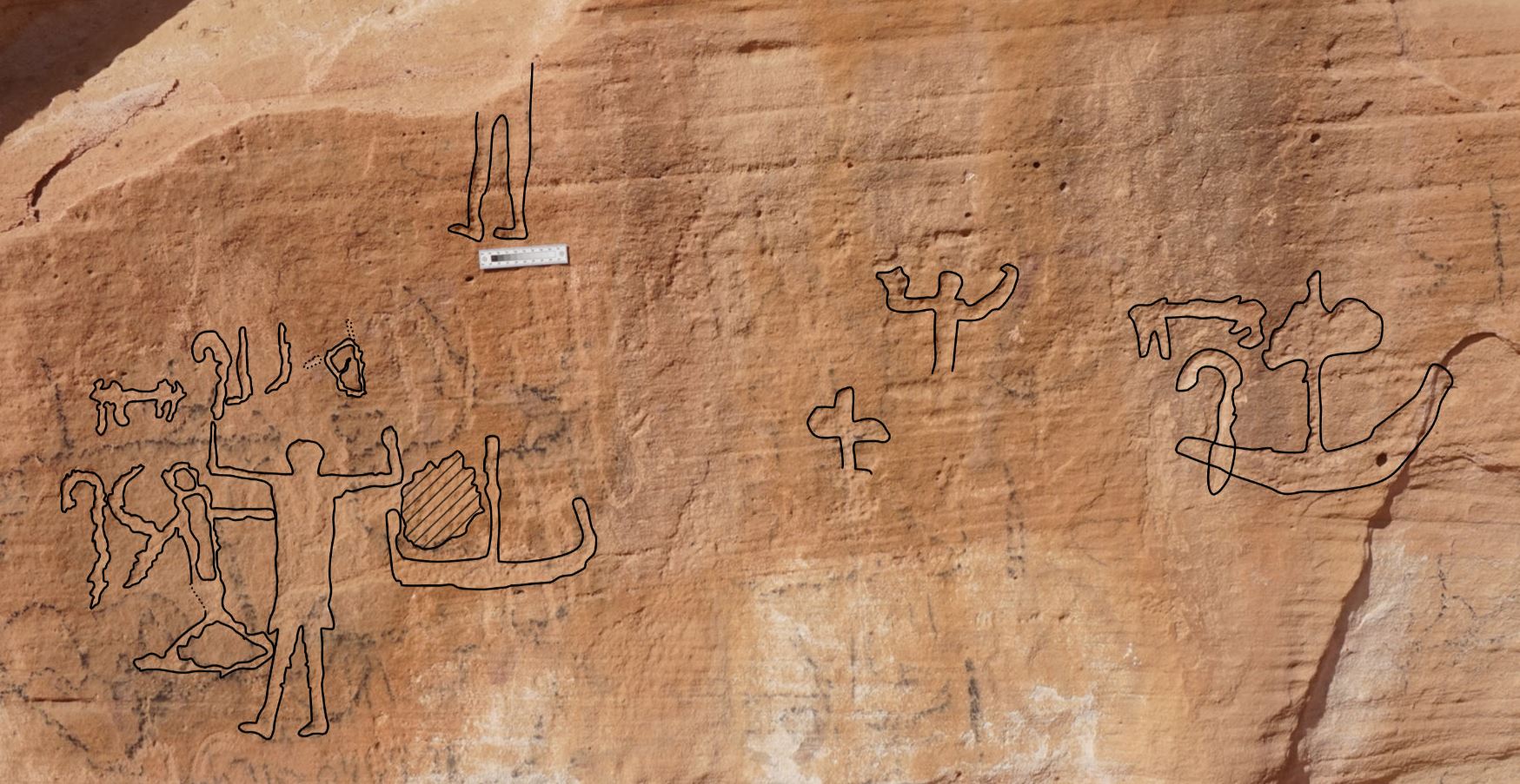 Наскальная надпись в Вади-Хамиле. Обнаруженная сцена, возраст которой оценивается примерно в 5000 лет, изображает египтянина в позе победителя и коленопреклоненного синаита со стрелой в груди. Египтолог Людвиг Моренц интерпретирует это как древнейшее свидетельство колониальных притязаний Египта. Фото: М. Нур Эль-Дин